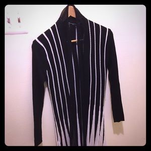 Black and white knitted sweater.